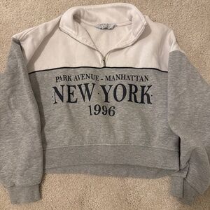 Primark women’s Manhattan cropped half zip sweater